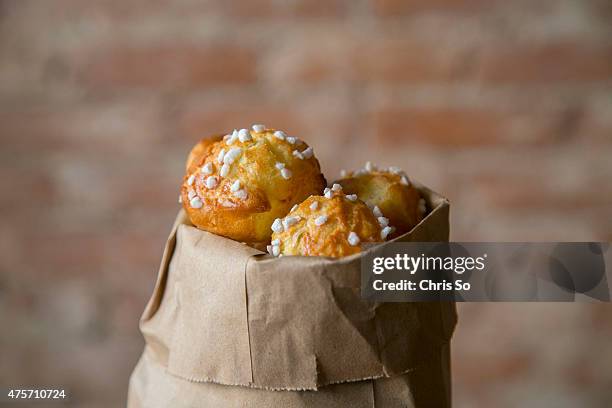 Bag of chouquettes by French Chef Bertrand Alepee. He is the owner of the Tempered Room shows Sourced how he makes chouquettes.