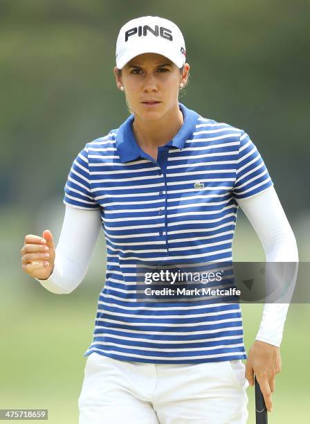Azahara Munoz of Spain celebrates making a birdie on the 17th hole during the third round of the HSBC Women's Champions at the Sentosa Golf Club on...