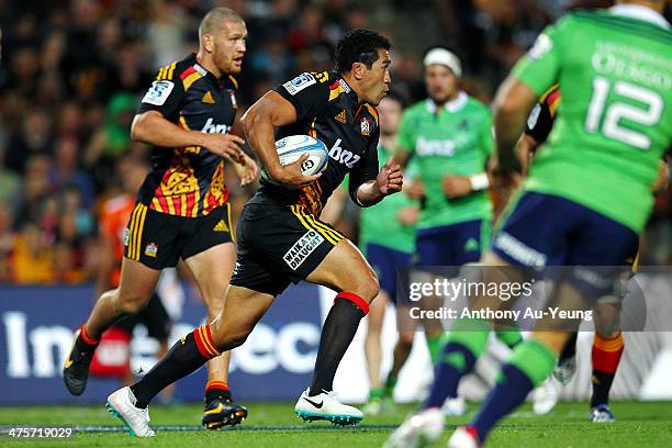 Mils Muliaina of the Chiefs makes a run during the round three Super Rugby match between the Chiefs and the Highlanders at Waikato Stadium on March...