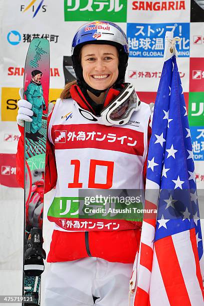 Silver medalist Heather Mcphie of USA smiles on the podium in the medal ceremony during the 2014 FIS Free Style Ski World Cup Inawashiro at Listel...