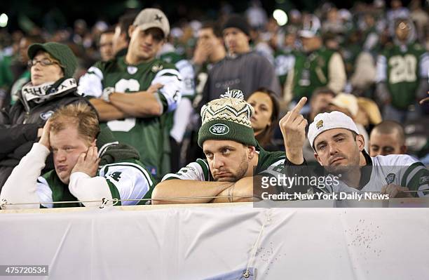 Dejected Jets fans, 4th quarter of New York Jets vs. New England Patriots at MetLife Stadium.