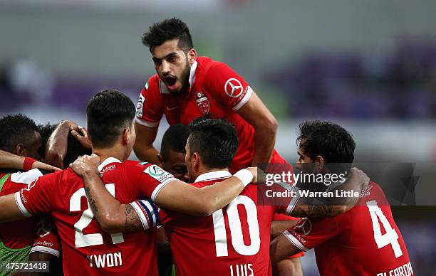 The Al Ahli team celebrate the opening goal of Ahmed Khalil Sebait Mubark Alkunaibi during the President's Cup Final between Al Ahli and Al Nasr at...
