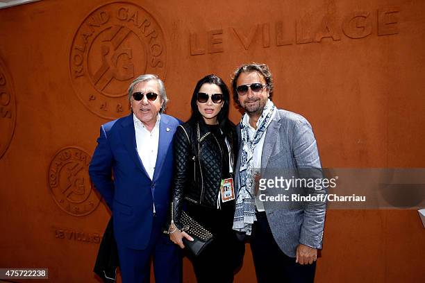 Former tennis player Ilie Nastase with his wife Brigitte and Former Tennis Player Henri Leconte attend the 2015 Roland Garros French Tennis Open -...