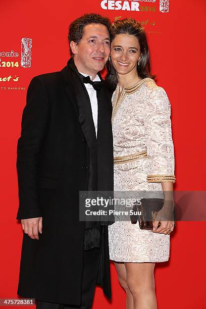 Guillaume Gallienne and his wife Amandine arrive for dinner after the 39th Cesar Film Awards 2014 at Le Fouquet's on February 28, 2014 in Paris,...