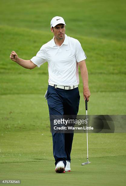 Ross Fisher of England celebrates a birdie on the third green during the third round of the Tshwane Open at Copperleaf Golf & Country Estate on March...