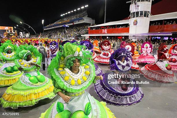 Members of the Dragoes da Real samba school perform during the first night of the Sao Paulo's Carnival parade at the Sambodromo on February 28, 2014...