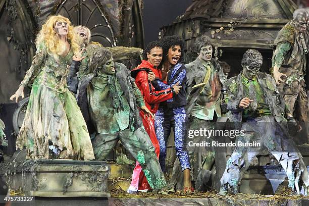 Members of the Dragoes da Real samba school perform during the first night of the Sao Paulo's Carnival parade at the Sambodromo on February 28, 2014...