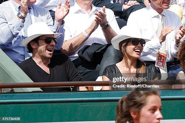 Singer Patrick Bruel and Caroline Nielsen attend the 2015 Roland Garros French Tennis Open - Day Eleven, on June 3, 2015 in Paris, France.