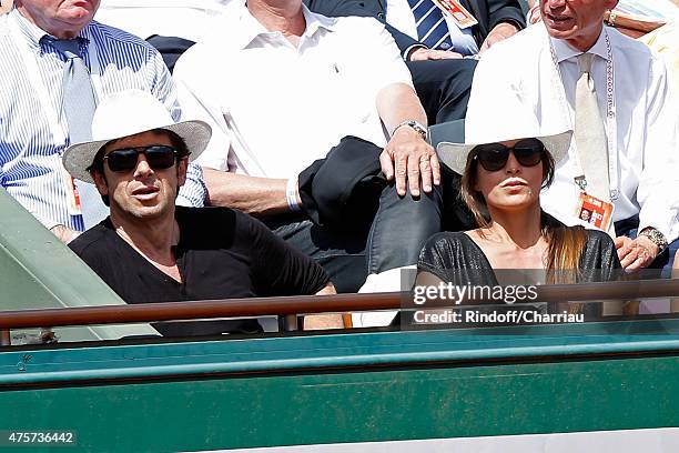 Singer Patrick Bruel and Caroline Nielsen attend the 2015 Roland Garros French Tennis Open - Day Eleven, on June 3, 2015 in Paris, France.