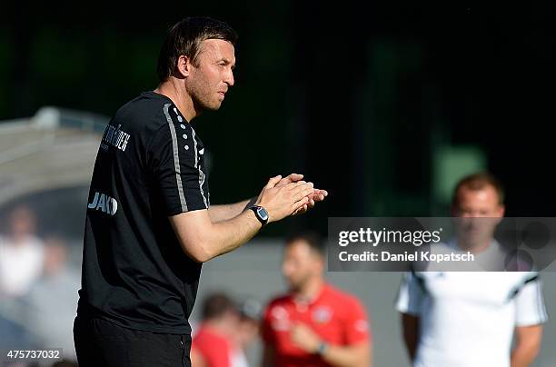 Coach Christoph Dabrowski of Hannover reacts during the B-Juniors Bundesliga semi final match between U17 VfB Stuttgart and U17 Hannover 96 at...