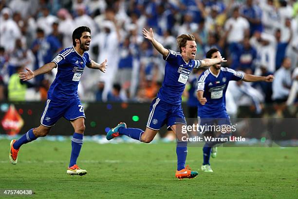 Brett Holman, Al Nasr Captain leads the celebrations after winning the penalty shoot out to win the President's Cup Final between Al Ahli and Al Nasr...