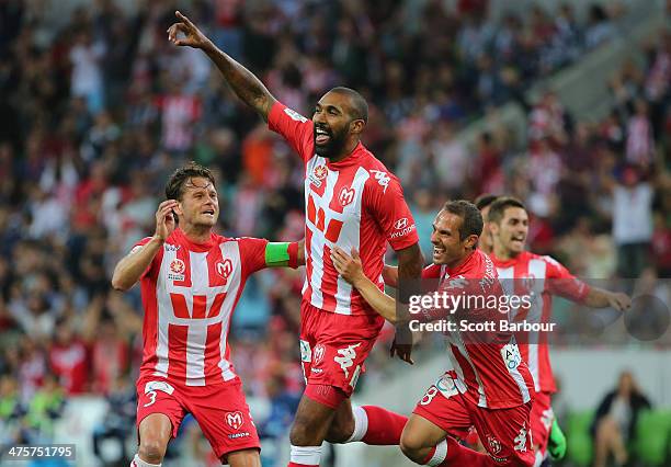 Orlando Engelaar of the Heart is congratulated by his teammates after scoring the first goal of the game during the round 21 A-League match between...