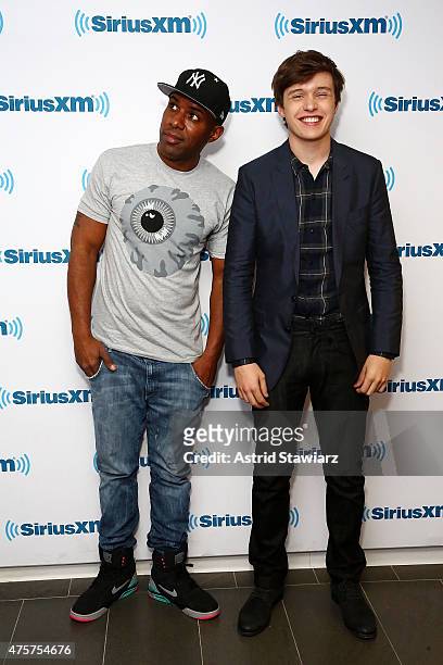 Sirius XM host DJ Whoo Kid and actor Nick Robinson pose for photos at the SiriusXM Studios on June 3, 2015 in New York City.