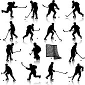 silhouettes of hockey player