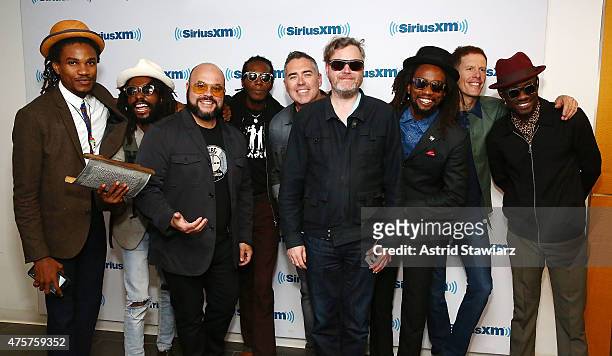 Musicans from dub band and poetry group, No-Maddz pose with The Barenaked Ladies at the SiriusXM Studios on June 3, 2015 in New York City.