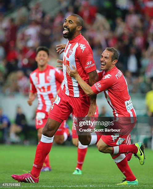 Orlando Engelaar of the Heart is congratulated by his teammates after scoring the first goal of the game during the round 21 A-League match between...