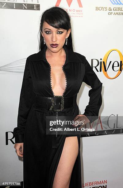Actress Devanny Pinn arrives for the Viva Glam Issue Launch Party Hosted by cover girl Leah Remini held at Riviera 31 on June 2, 2015 in Beverly...