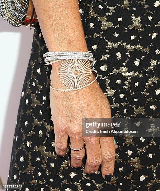 Actress Minnie Driver, bracelet detail, attends the British Consul General hosted Theirworld collaboration with Astley Clarke summer reception at The...