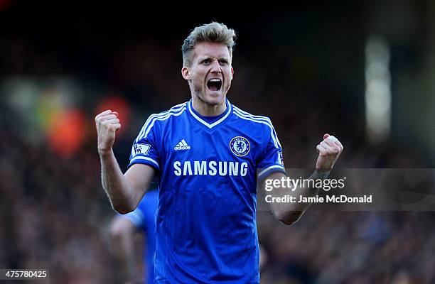 Andre Schurrle of Chelsea celebrates as he scores their second goal during the Barclays Premier League match between Fulham and Chelsea at Craven...