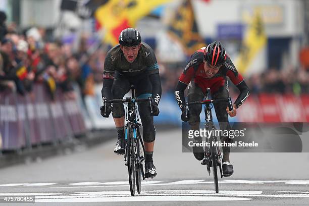Ian Stannard of Great Britain and Team Sky claims victory from Greg Van Avermaet of Belgium and BMC Racing Team during the Omloop Het Nieuwsblad on...