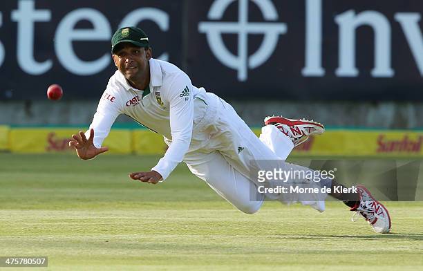 Robin Peterson of South Africa attempts to take a catch to dismiss Michael Clarke of Australia during the third test match between South Africa and...