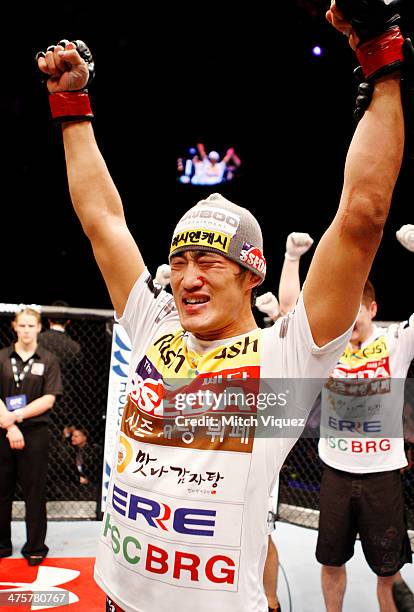 Dong Hyun Kim celebrates after win over John Hathaway in their welterweight fight during the UFC Fight Night event at the Venetian Macau on March 1,...