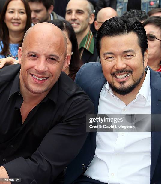 Actor Vin Diesel and director Justin Lin attend the Hand and Footprint Ceremony for Justin Lin, Zhao Wei and Huang Xiaoming at the TCL Chinese...