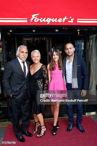 Mansour Bahrami,his wife Frederique and his Son Sam Bahrami with his fiancee Gabrielle Picard attend the Trophee des Legendes Dinner at Le Fouquet's,...