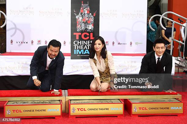 Director Justin Lin, actors Zhao Wei and Huang Xiaoming are honored with hand/footprint ceremony during the 88th Birthday Commemoration Of TCL...