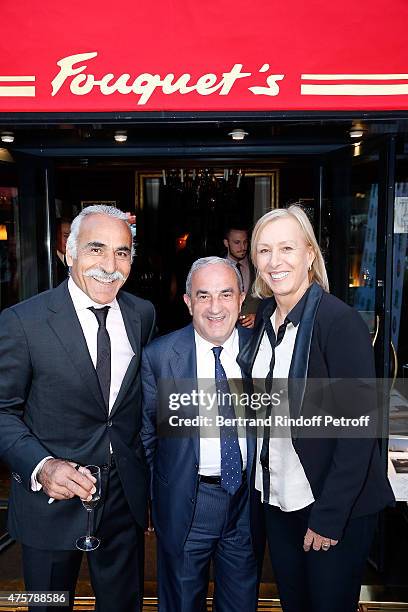 Mansour Bahrami, Jean Gachassin, President of Federation Francaise de Tennis and Martina Navratilova attend the Trophee des Legendes Dinner at Le...