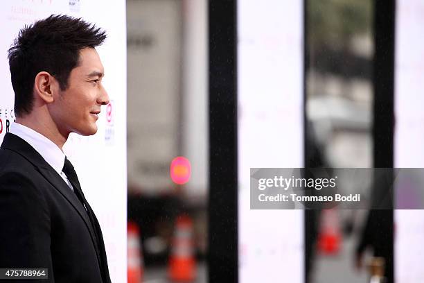 Actor Huang Xiaoming is honored with hand/footprint ceremony during the 88th Birthday Commemoration Of TCL Chinese Theatre IMAX at the TCL Chinese...