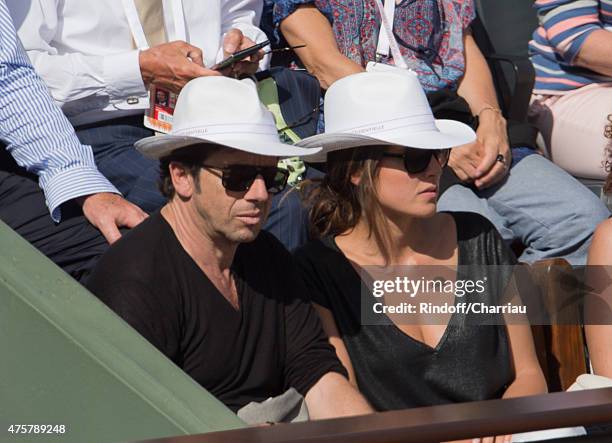 Patrick Bruel and Caroline Nielsen attend the French open at Roland Garros on June 3, 2015 in Paris, France.