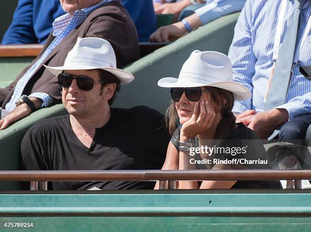 Patrick Bruel and Caroline Nielsen attend the French open at Roland Garros on June 3, 2015 in Paris, France.