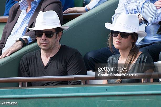 Patrick Bruel and Caroline Nielsen attend the French open at Roland Garros on June 3, 2015 in Paris, France.