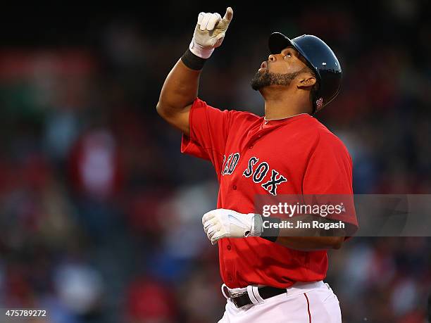 Carlos Peguero of the Boston Red Sox reacts after he singled in the third inning against the Minnesota Twins during the second game of a doubleheader...