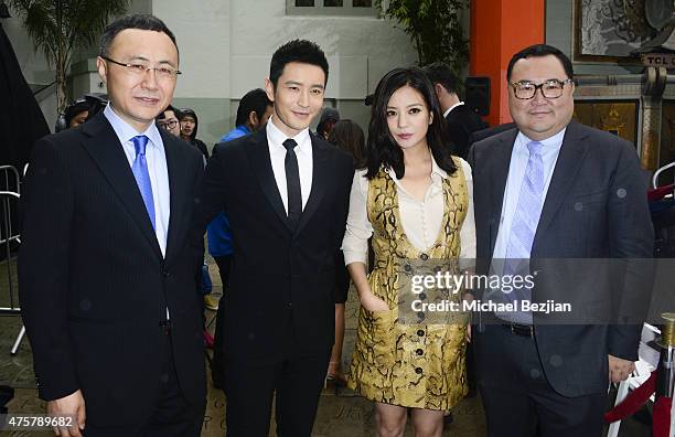 Chairman/CEO of Enlight Wang Changtian, Actor Huang Xlaoming, Actress Zhao Wei and Entertainment partner Bruno Wu pose for portrait at TCL Chinese...