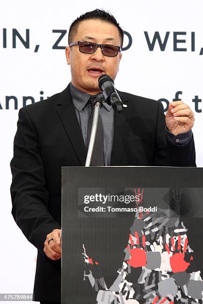 Mr. E attends the TCL Chinese Theatre IMAX hand/footprint ceremony honoring Justin Lin, Zhao Wei, Huang Xiaoming during the 88th Birthday...