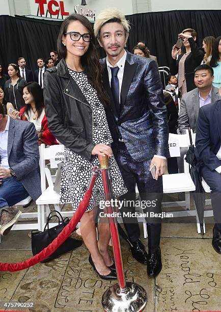 Actress Jordana Brewster and Sun Zu Wang pose for portrait at Bruno Wu and Seven Stars Entertainment Sponsor TCL Chinese Theatre Handprints For...