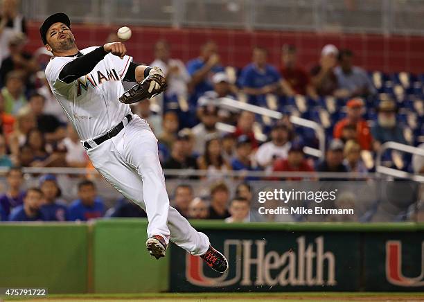 Martin Prado of the Miami Marlins makes a throw to first during a game against the Chicago Cubs at Marlins Park on June 3, 2015 in Miami, Florida.