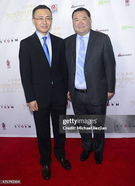 Chairman/CEO of Enlight Wang Changtian and Chairman/Seven Stars Entertainment partner Bruno Wu pose for portrait at TCL Chinese Theatre on June 3,...