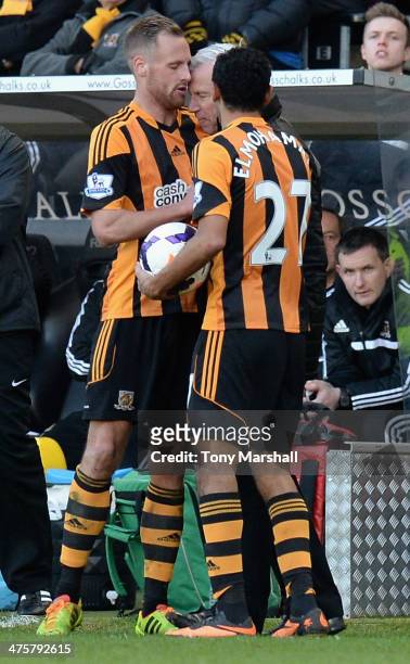 David Meyler of Hull City clashes with Alan Pardew, Manager of Newcastle United during the Barclays Premier League match between Hull City and...