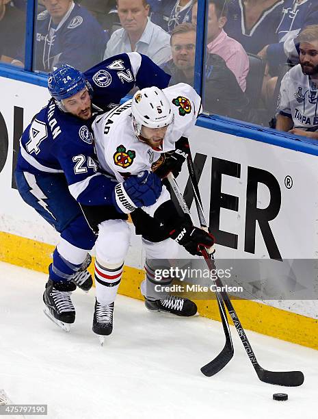 Ryan Callahan of the Tampa Bay Lightning defends against David Rundblad of the Chicago Blackhawks during Game One of the 2015 NHL Stanley Cup Final...