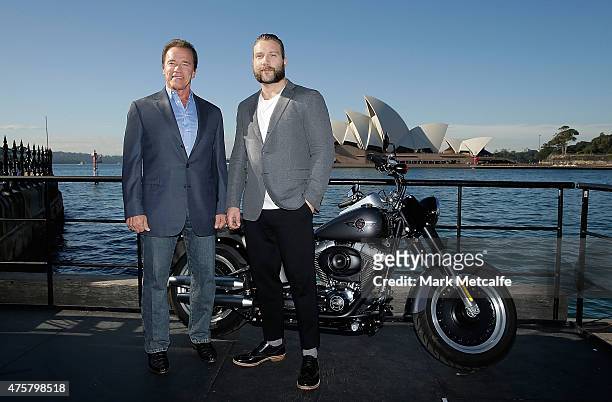 Arnold Schwarzenegger and Jai Courtney pose during a 'Terminator Genisys' photo call at the Park Hyatt Sydney on June 4, 2015 in Sydney, Australia.