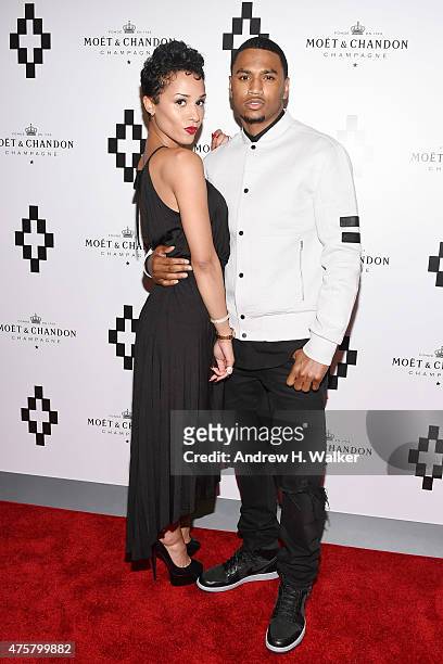 Model Tanaya Henry and singer-songwriter Trey Songz attend the Moet Nectar Imperial Rose x Marcelo Burlon Launch Event on June 3, 2015 in New York...