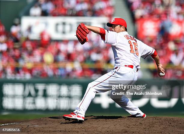 Hiroki Kuroda of Hiroshima Carp pitches during the game against Yakult Swallows at Mazda Zoom Zoom Stadium on March 29, 2015 in Hiroshima, Japan.