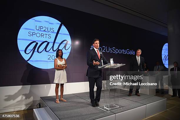 Honorees Mo'ne Davis and coach Steve Bandura, and Up2Us Sports Founder and CEO Paul Caccamo address attendees during the Up2Us Sports celebration of...