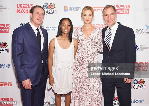 Dr. David Colbert, honoree Mo'ne Davis, model Carolyn Murphy, and Up2Us Sports Founder and CEO Paul Caccamo attend the Up2Us Sports celebration of 5...