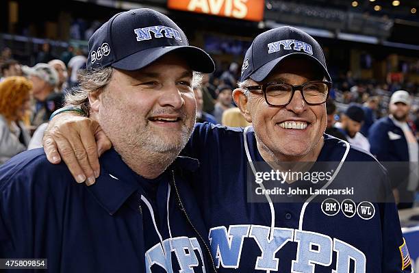 Artie Lange and former Mayor of New York City Rudolph Giuliani participate in the True Blue Celebrity Softball Game at the True Blue Celebrity...