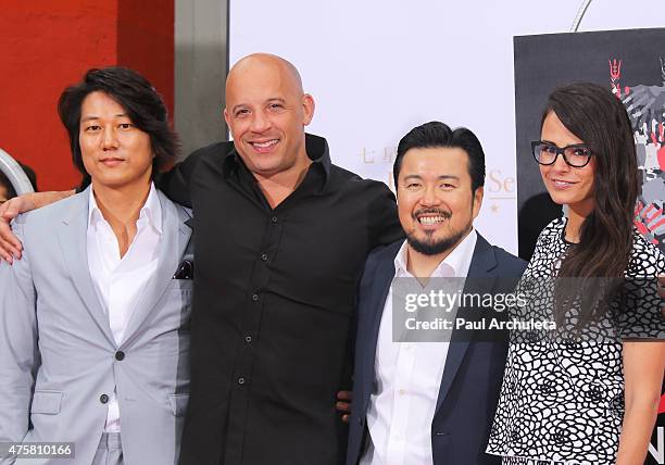 Sung Kang, Vin Diesel, Justin Lin and Jordana Brewster attend the "Hand and Footprint Ceremony" at The TCL Chinese Theatre IMAX on June 3, 2015 in...