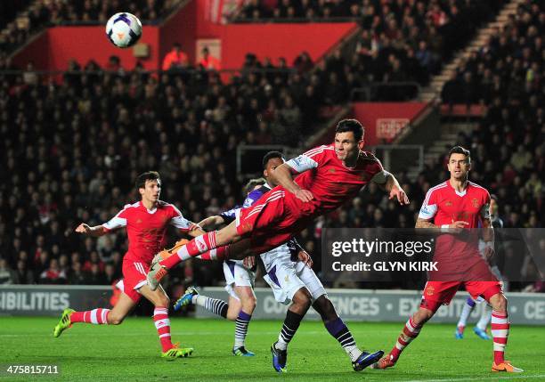 Southampton's Croatian defender Dejan Lovren clears the ball during the English Premier League football match between Southampton and Liverpool at St...